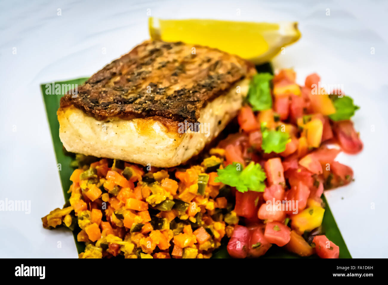 Pan fried white snapper Stock Photo - Alamy