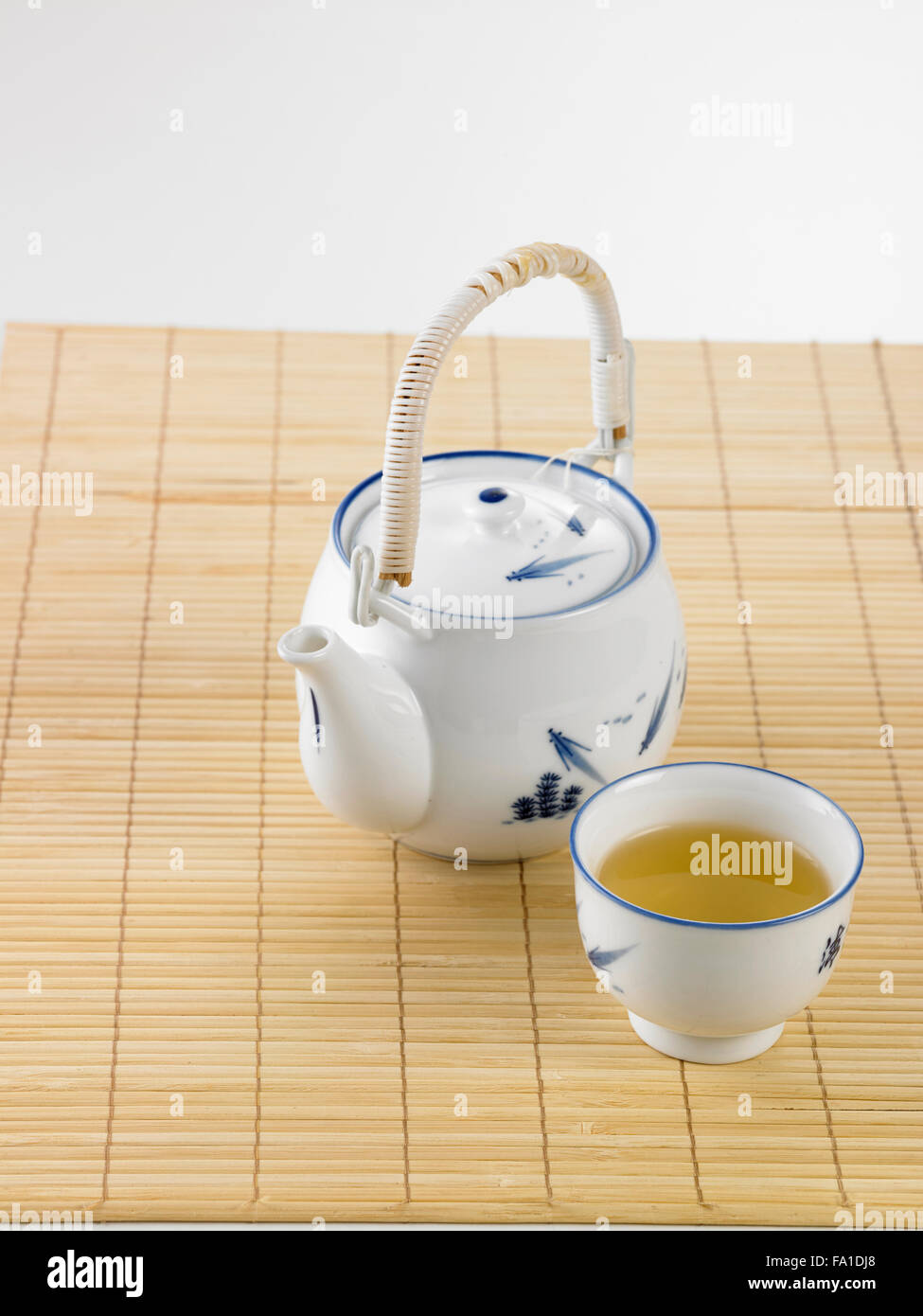 Japanese white tea pot on the bamboo mat Stock Photo Alamy