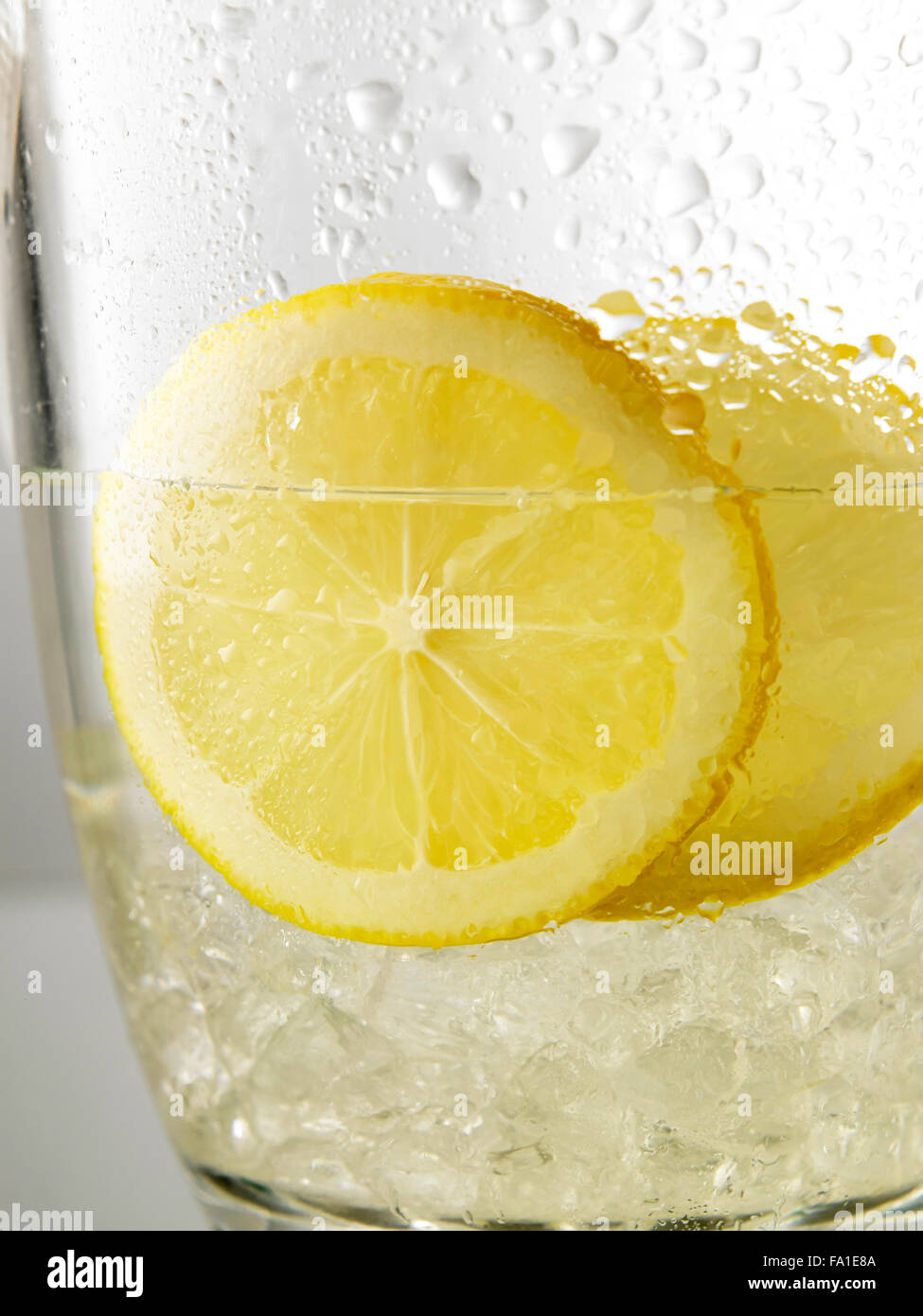Refreshing Ice Cold Water with Lemon ready to drink Stock Photo Alamy