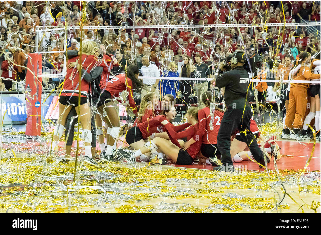 Omaha, NE. USA. 19th Dec, 2015. Nebraska players dog pile and celebrate