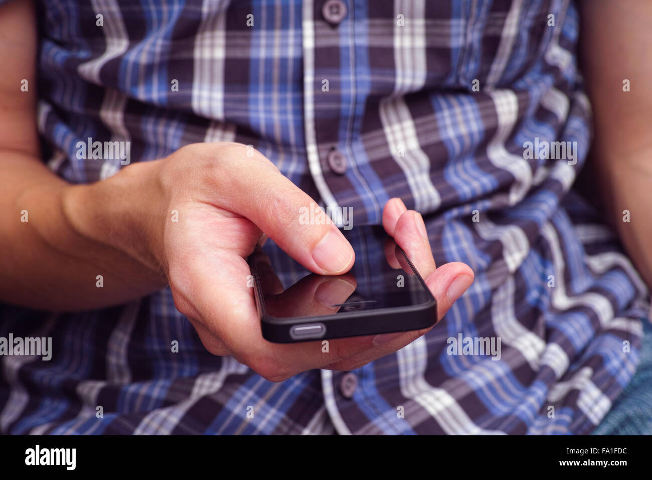 Young man using mobile smart phone. Close up Stock Photo - Alamy
