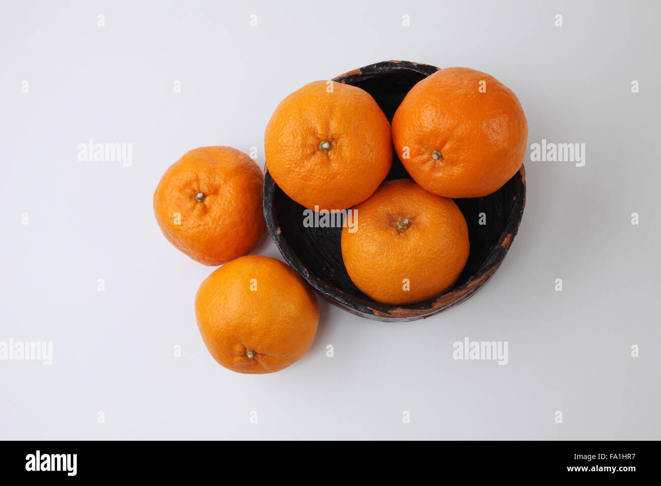 mandarin oranges in the red container Stock Photo Alamy