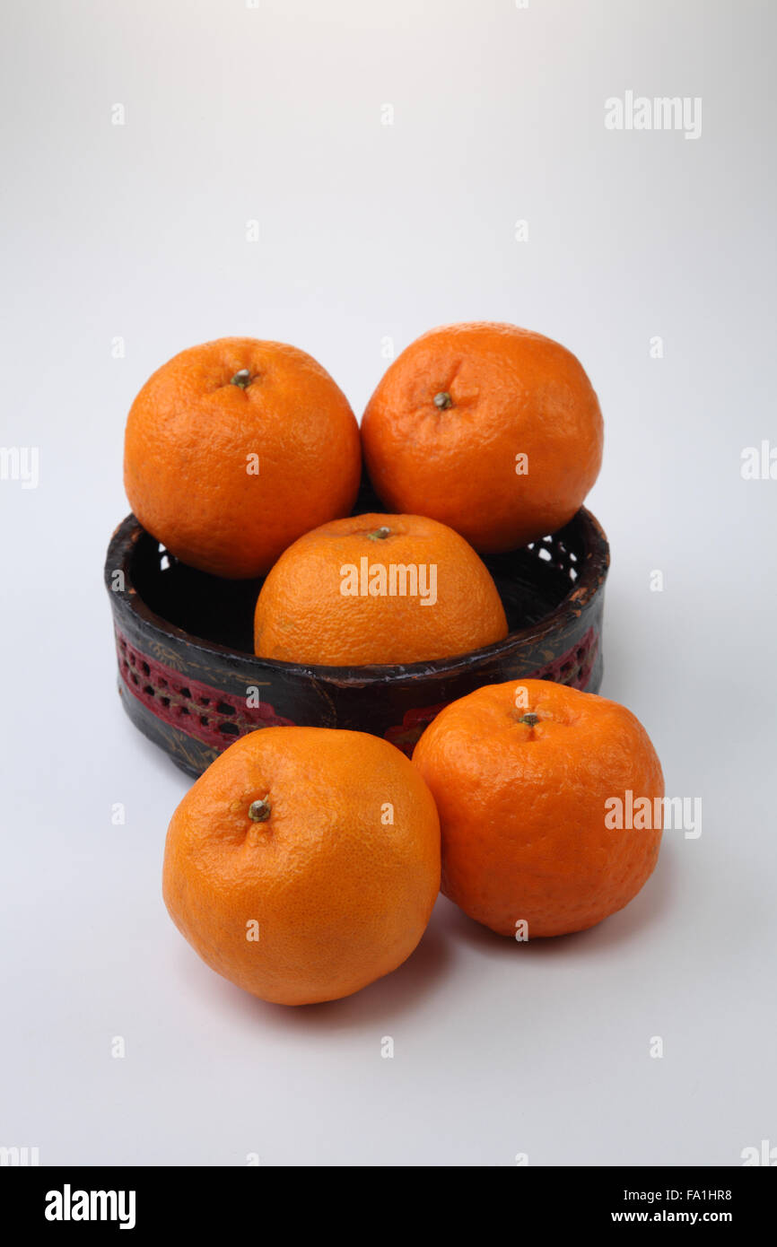 mandarin oranges in the red container Stock Photo Alamy