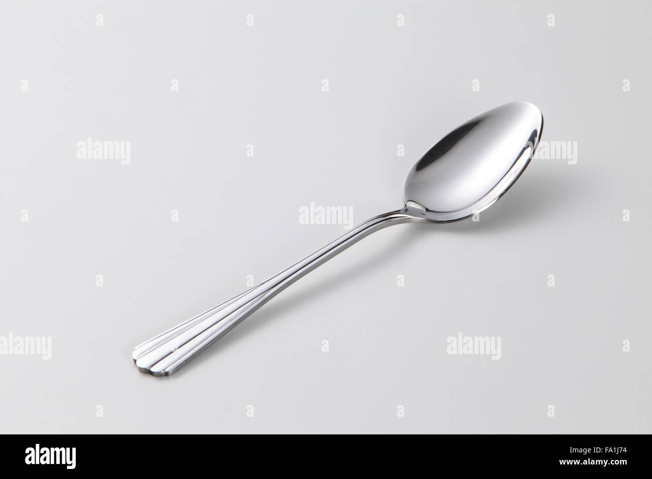 silver spoon on the white background Stock Photo Alamy