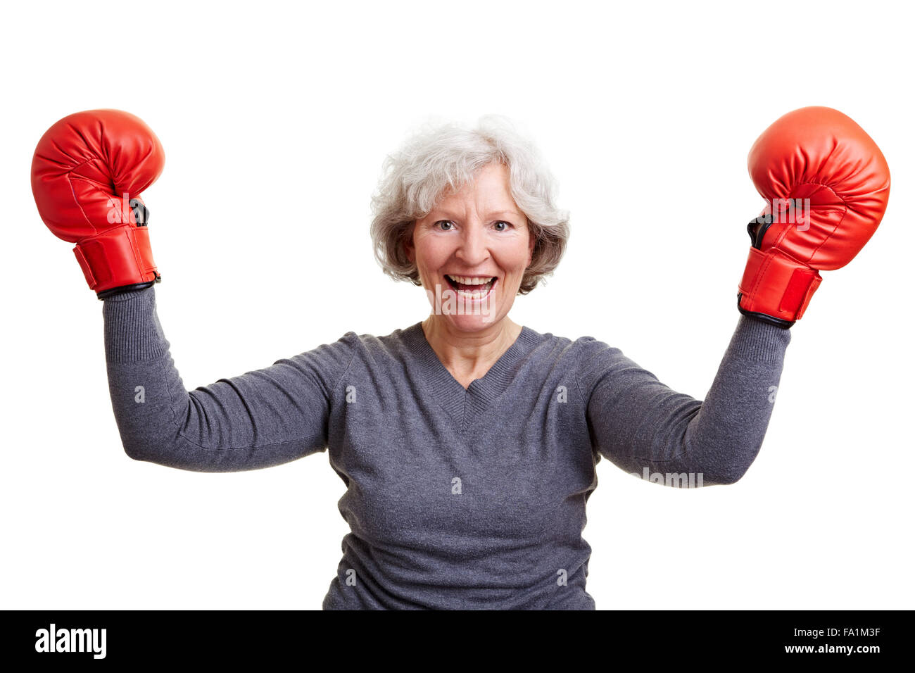 Happy Senior Woman Cheering With Red Boxing Gloves Stock Photo - Alamy