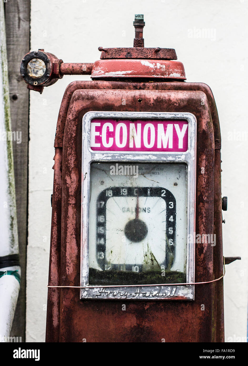 Old disused derelict petrol pump Stock Photo