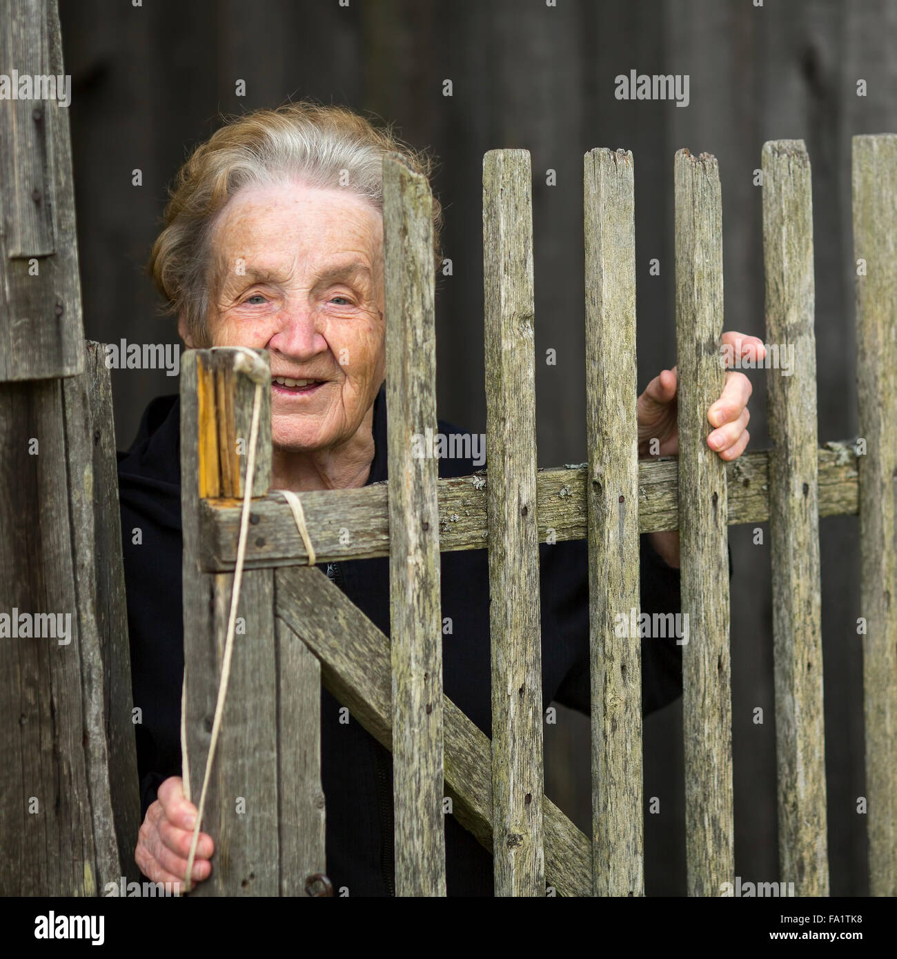 Portrait of an elderly woman in the village Stock Photo - Alamy