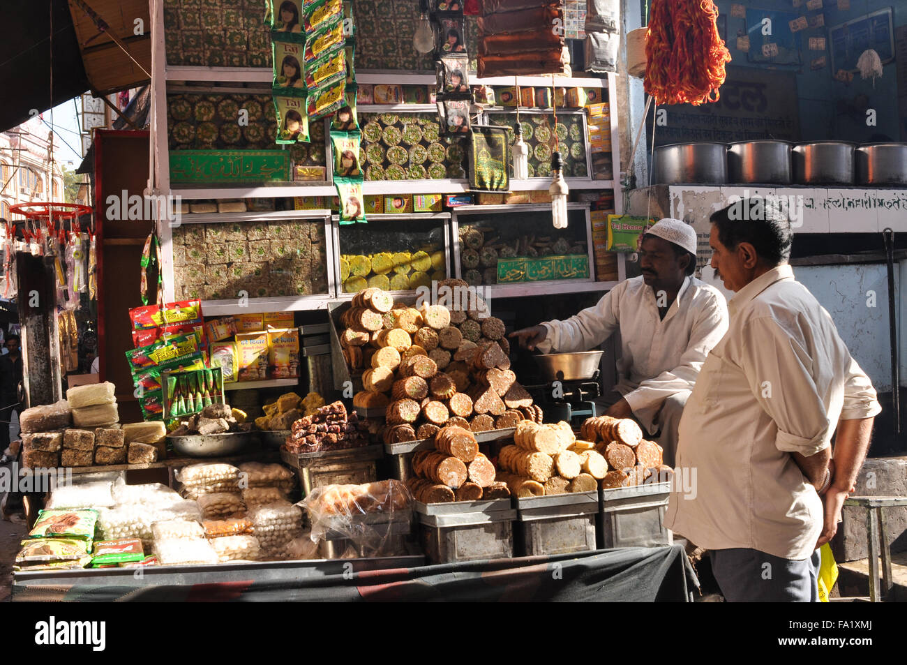 Savouries and sweet shops at shrine market place of Ajmer Sharif Dargah,   Mausoleum of Moinuddin Chishti, an Indian Sufi Saint. Stock Photo