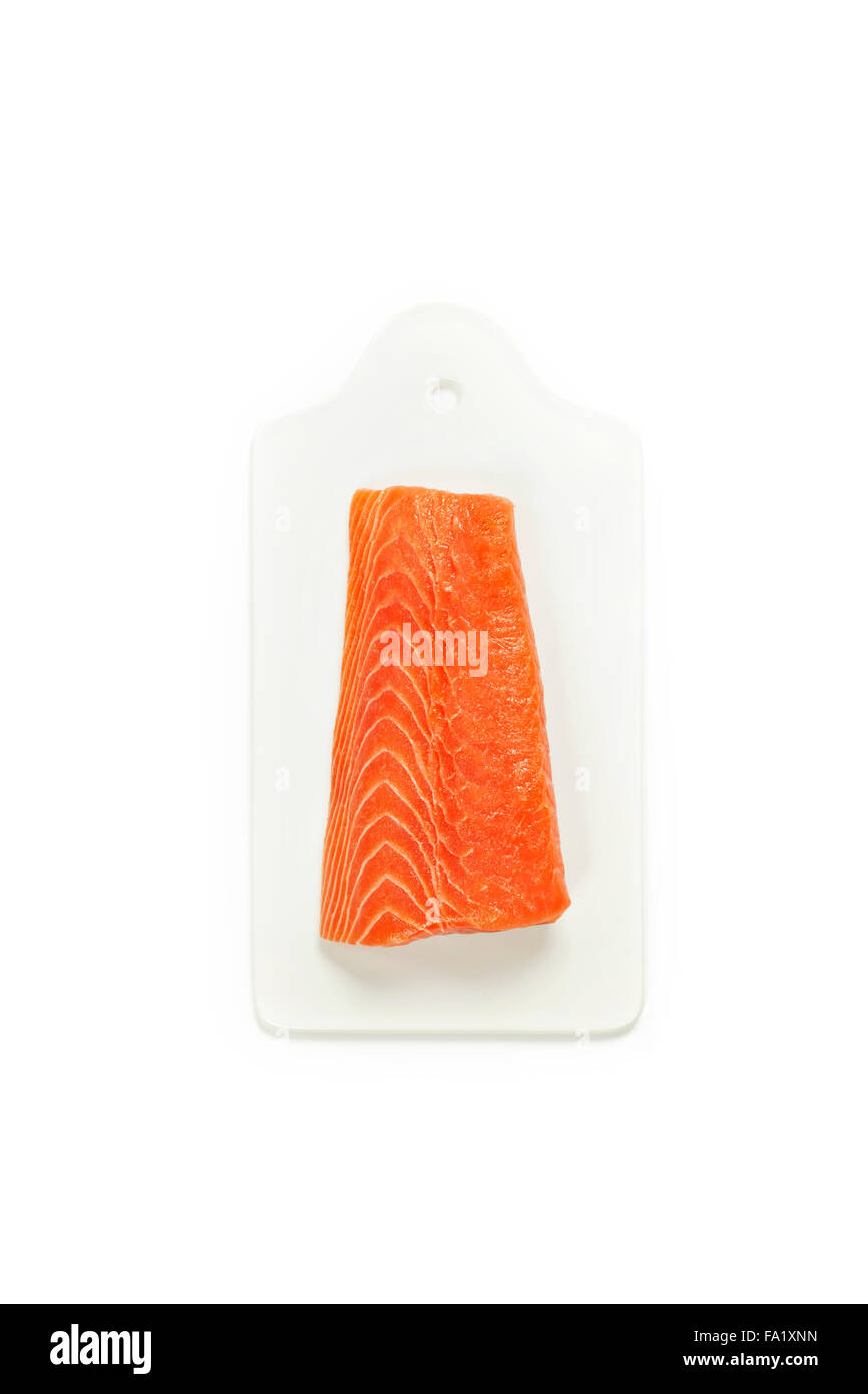 fresh raw salmon fillet on white background Stock Photo - Alamy