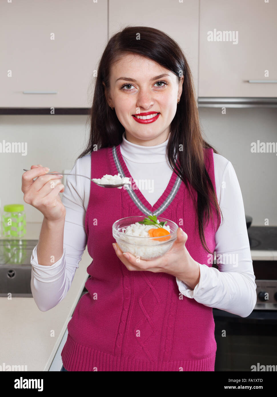 Woman eat rice hi-res stock photography and images - Alamy