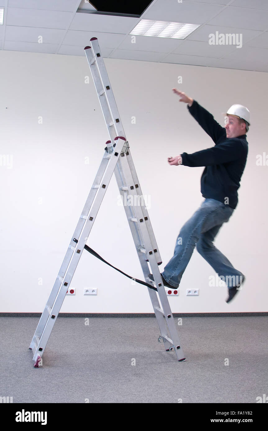 worker fell from a ladder accident at work Stock Photo Alamy