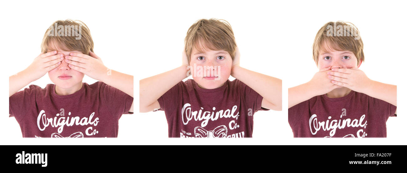 Young Boy shows three wise monkeys concept, Three Wise Monkeys, see no evil, hear no evil, speak no evil on a white background Stock Photo