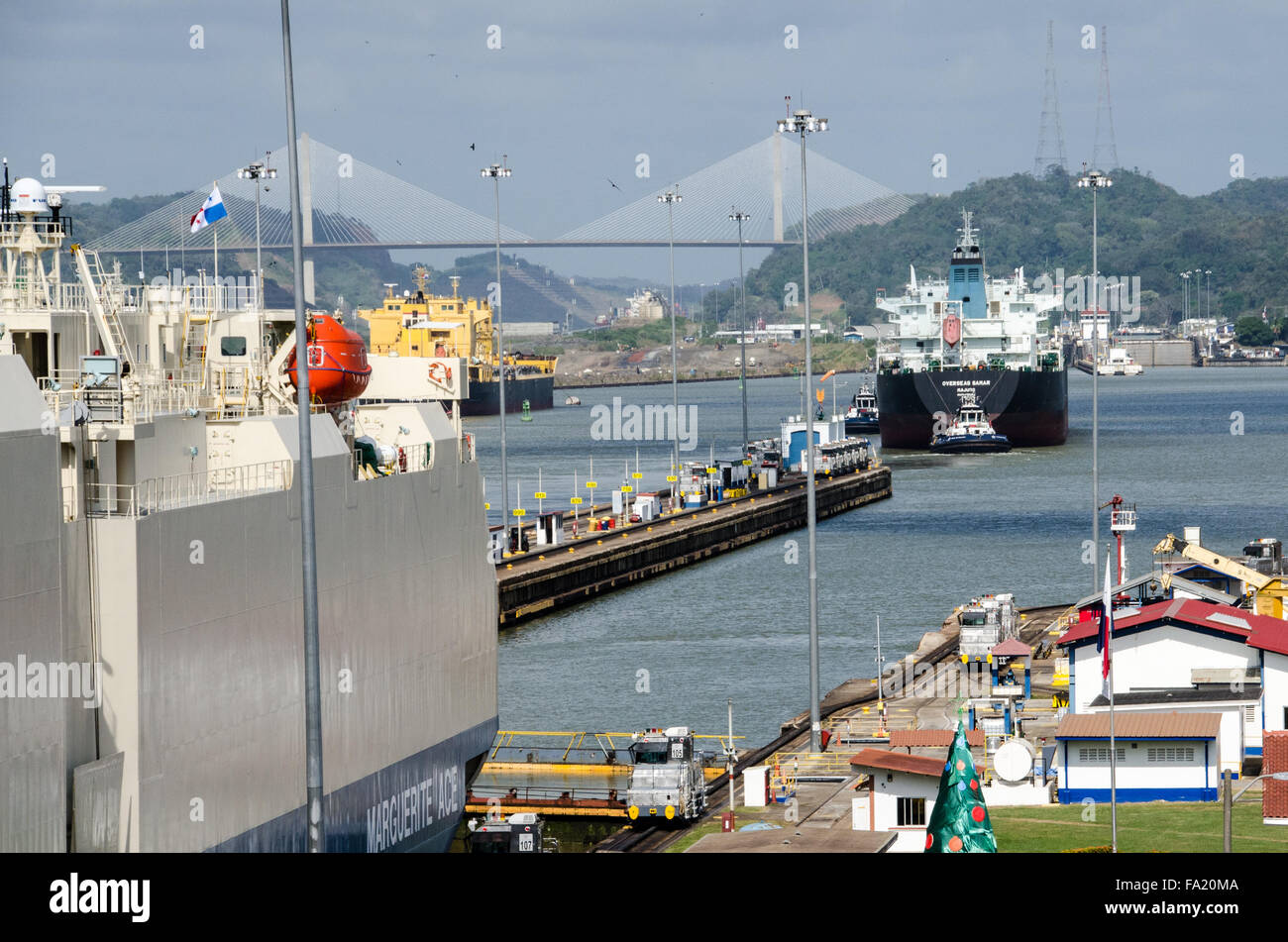 Ships entering Panama Canal after Miraflores Locks. Stock Photo