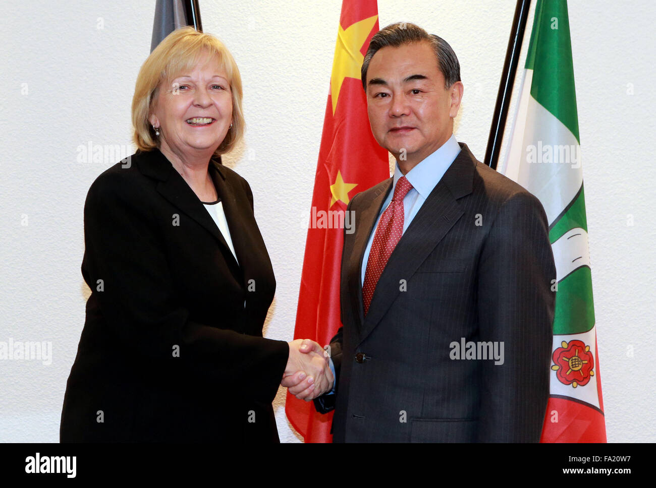 Duesseldorf. 19th Dec, 2015. Chinese Foreign Minister Wang Yi (R) meets with State Governor of Nordrhein-Westfalen Hannelore Kraft at the Consulate-General of China in Germany's Duesseldorf city, Dec. 19, 2015. © Luo Huanhuan/Xinhua/Alamy Live News Stock Photo