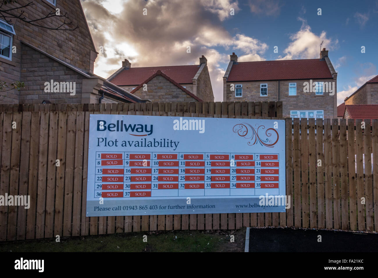 A new housing estate with all plots sold, BurleyinWharfedale, Yorkshire, England Stock Photo