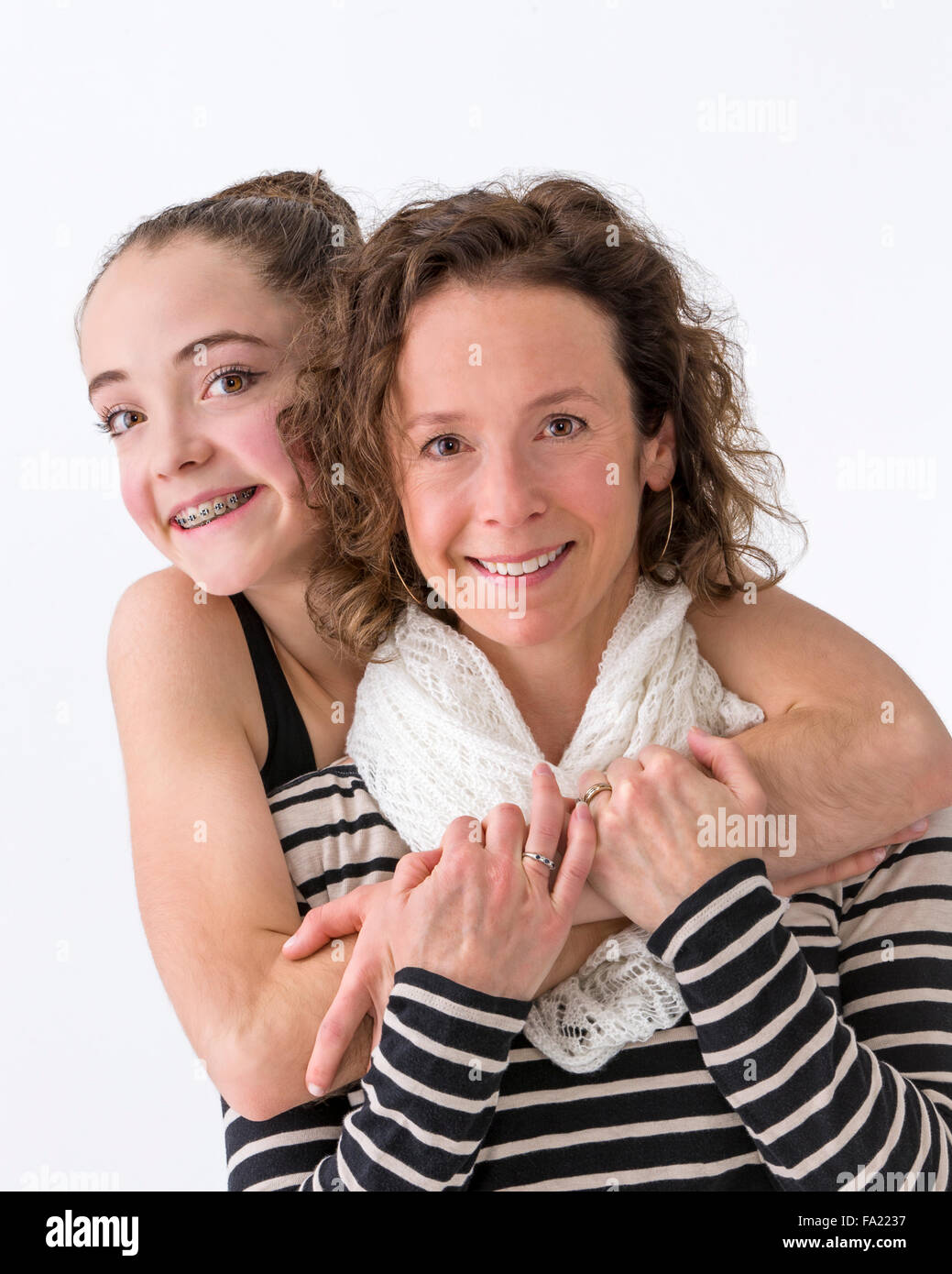 Studio portrait of of female teenage ballerina dancer with her mother Stock Photo