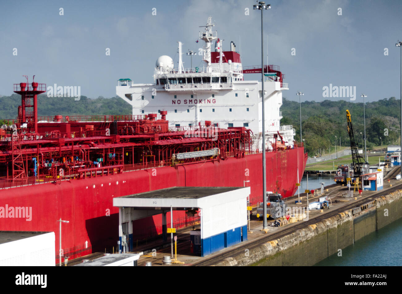 Gas Carrier Panamax Ship In Gatun Locks, Panama Canal. Panama Stock Photo