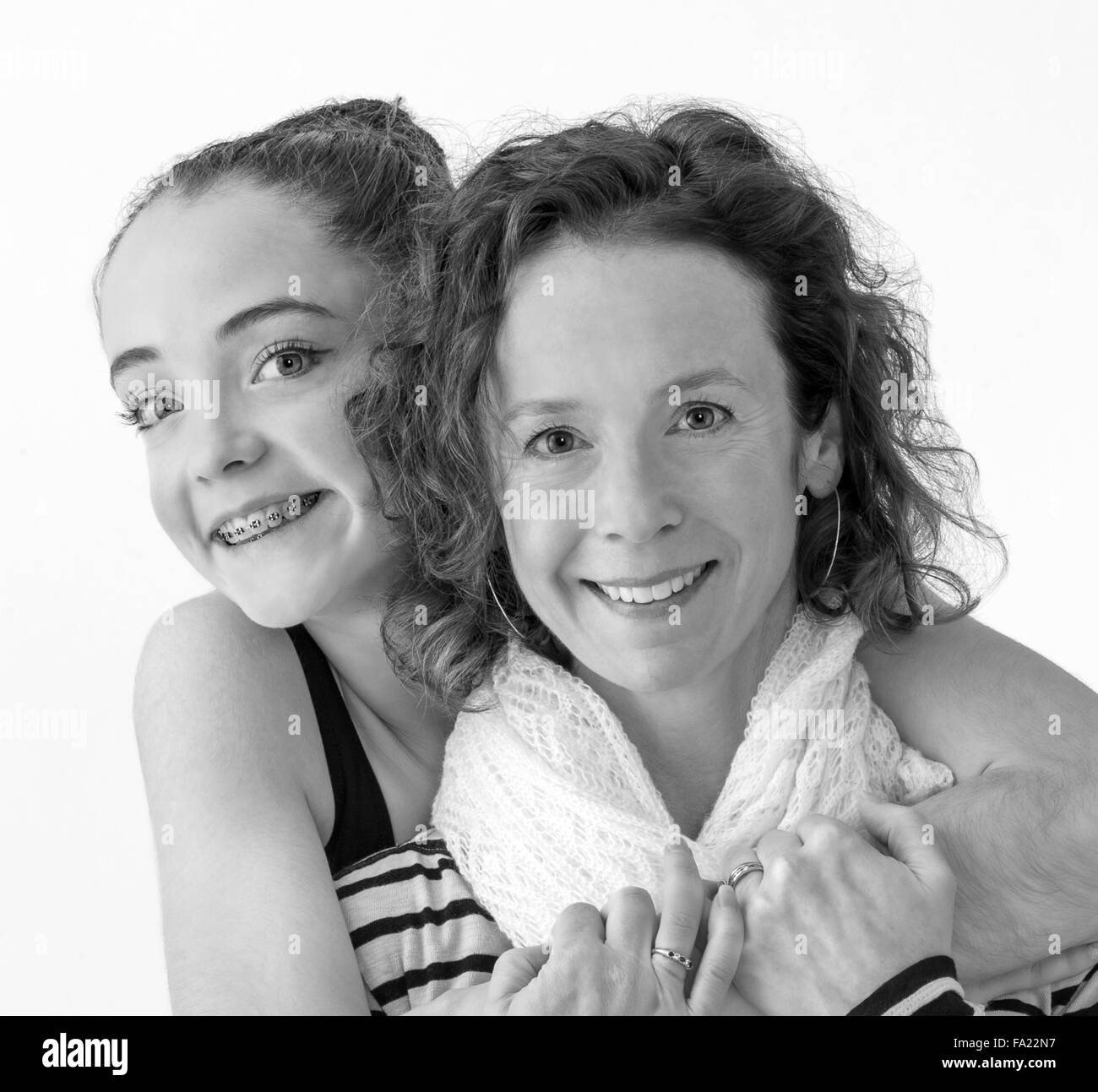 Black & white studio portrait of of female teenage ballerina dancer with her mother Stock Photo