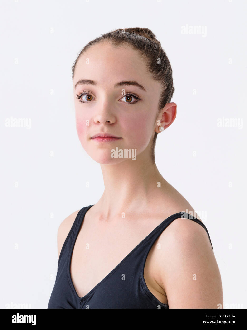 Studio portrait of a beautiful young female teenage ballerina dancer Stock Photo