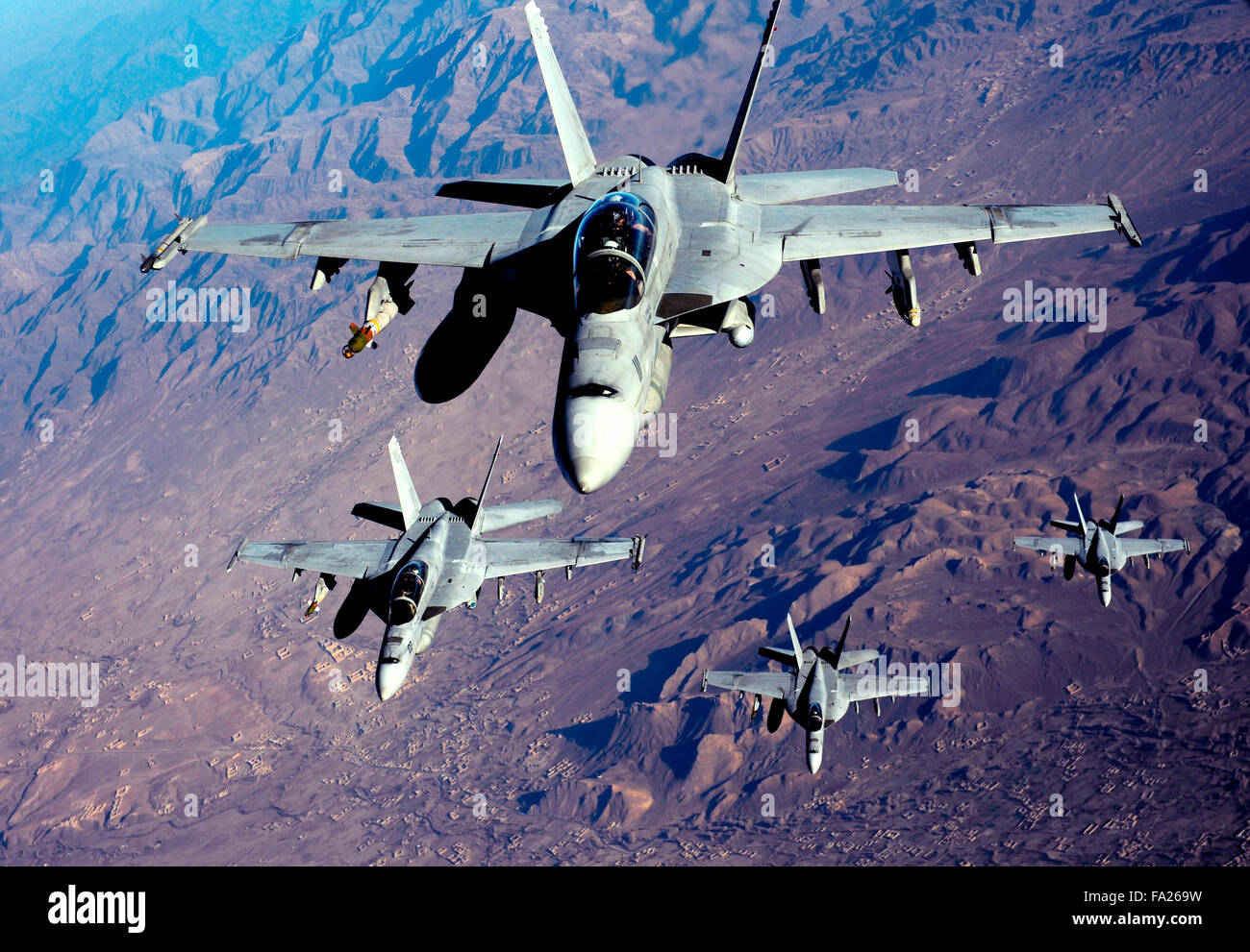 F/A-18 Super hornets over the mountains of Afghanistan. Stock Photo