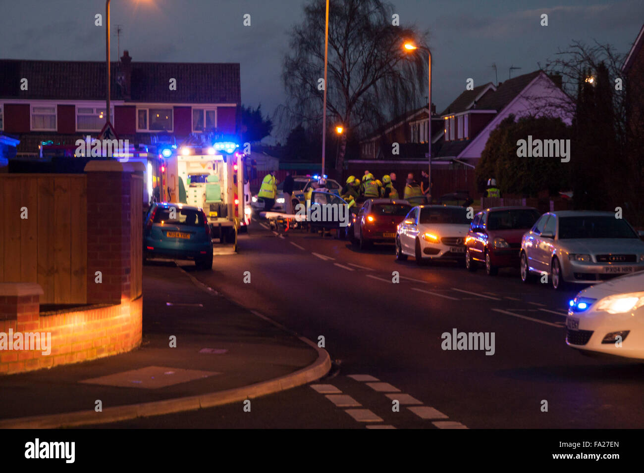Junction of Darlington Back Lane and Rimswell Road,Stockton-on-Tees 20th December 2015 Fire brigade and ambulance crews trying to free a woman trapped in a motor car after a Road Traffic Collision at about 4pm. David Dixon/Alamy Live News Stock Photo