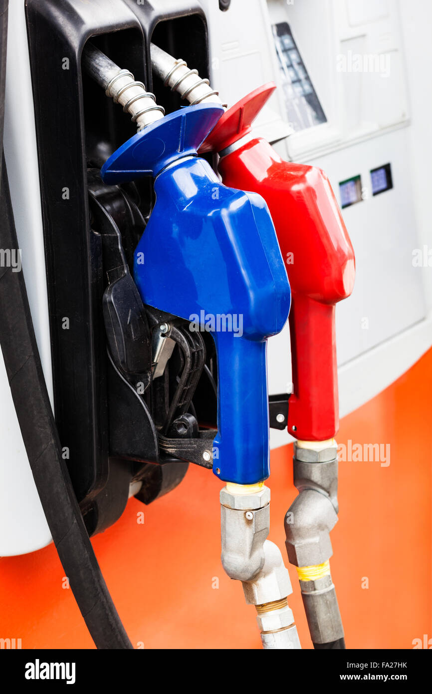 two gas hoses on a modern gas station Stock Photo - Alamy
