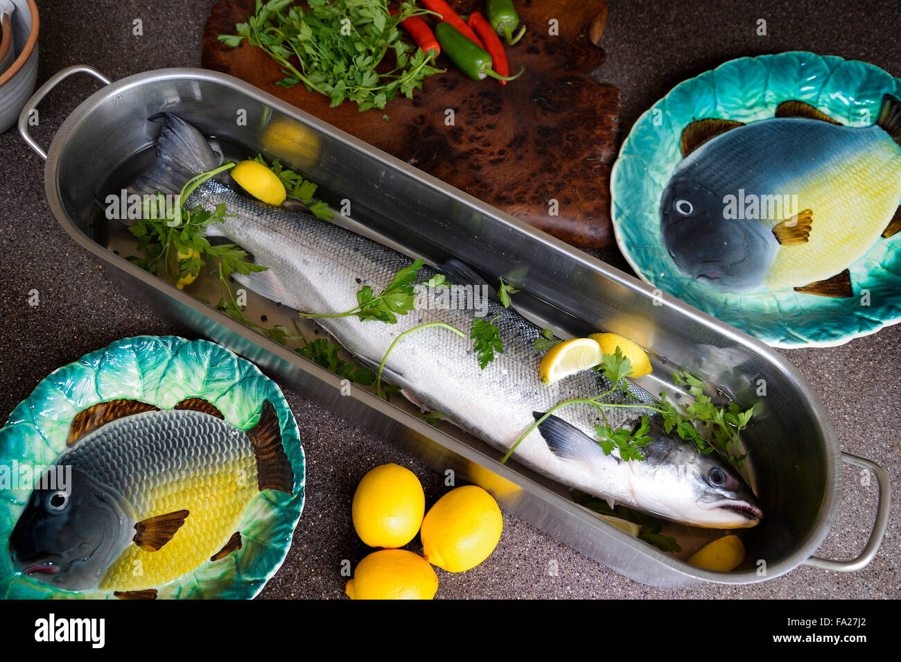 A whole fresh salmon prepared and ready to be cooked Stock Photo