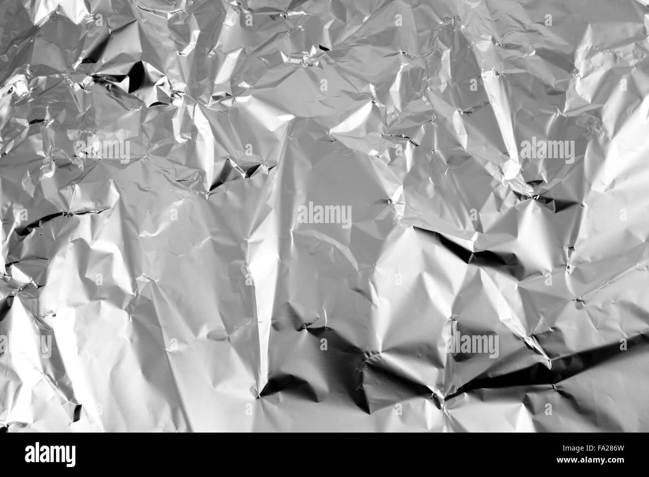 Background from wrinkled aluminum foil for cooking Stock Photo