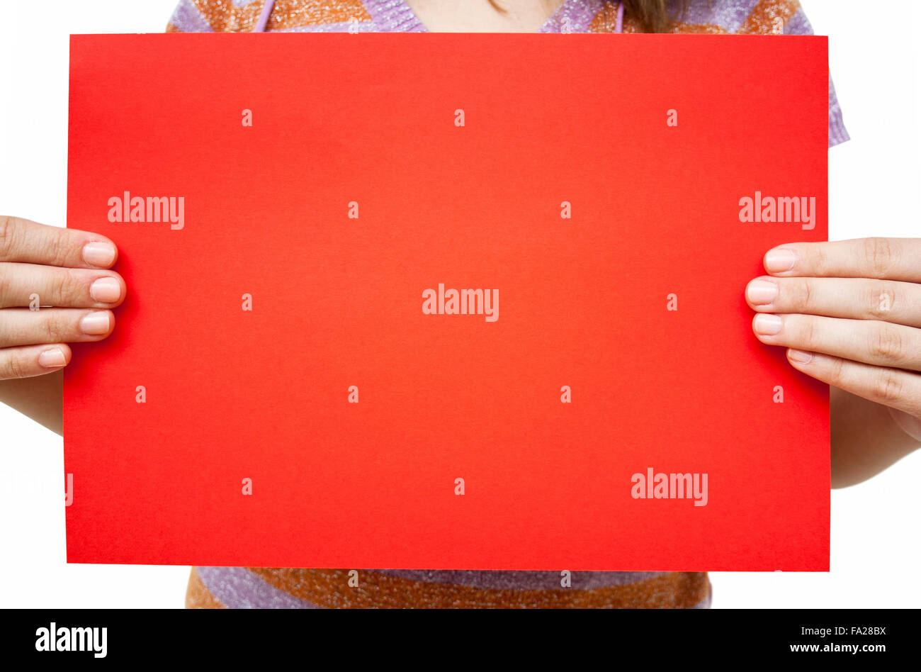 Young woman holding a red paper over white background Stock Photo - Alamy