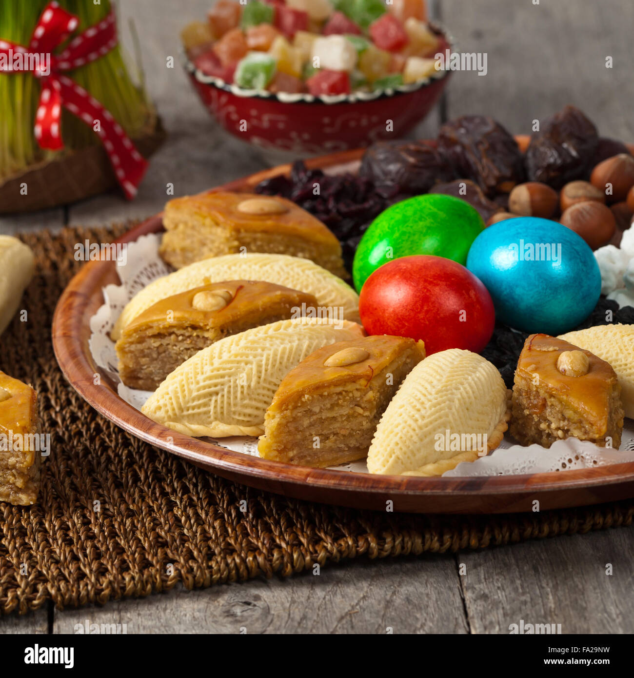 Colored eggs, wheat springs and candy on Nowruz holiday from Azerbaijan Stock Photo