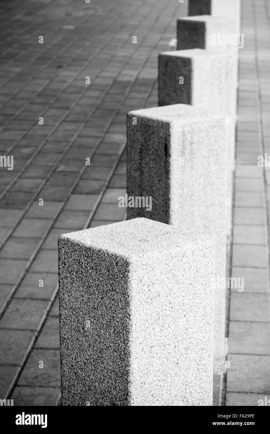 Abstract architecture composition, white square bollards in a row Stock Photo