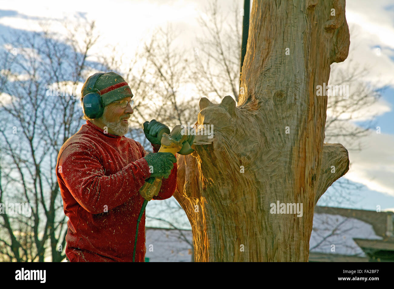 Wood carver using an angle grinder Stock Photo Alamy