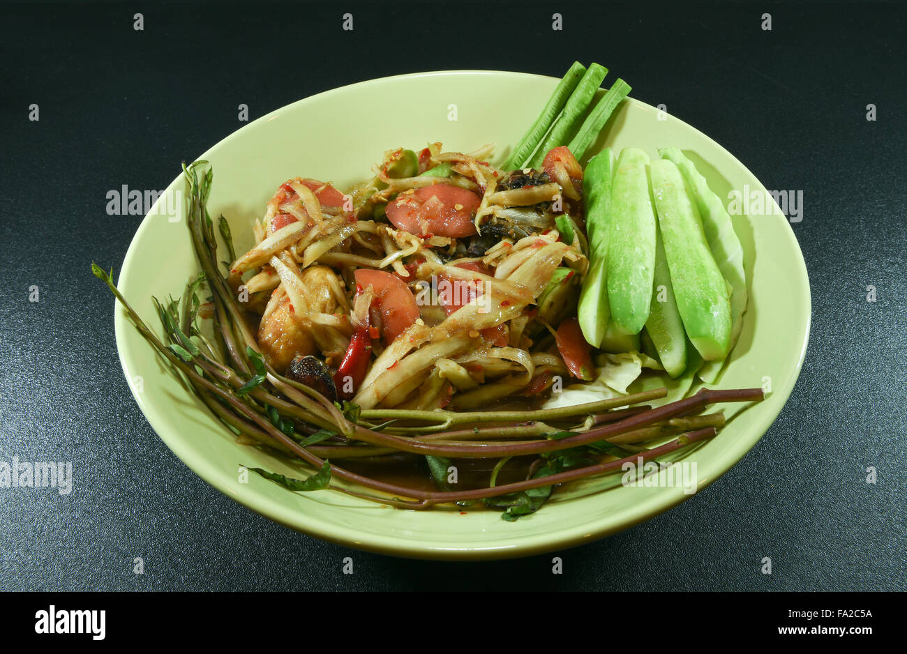 Papaya Salad Decorate Plate With Vegetables On Black Background