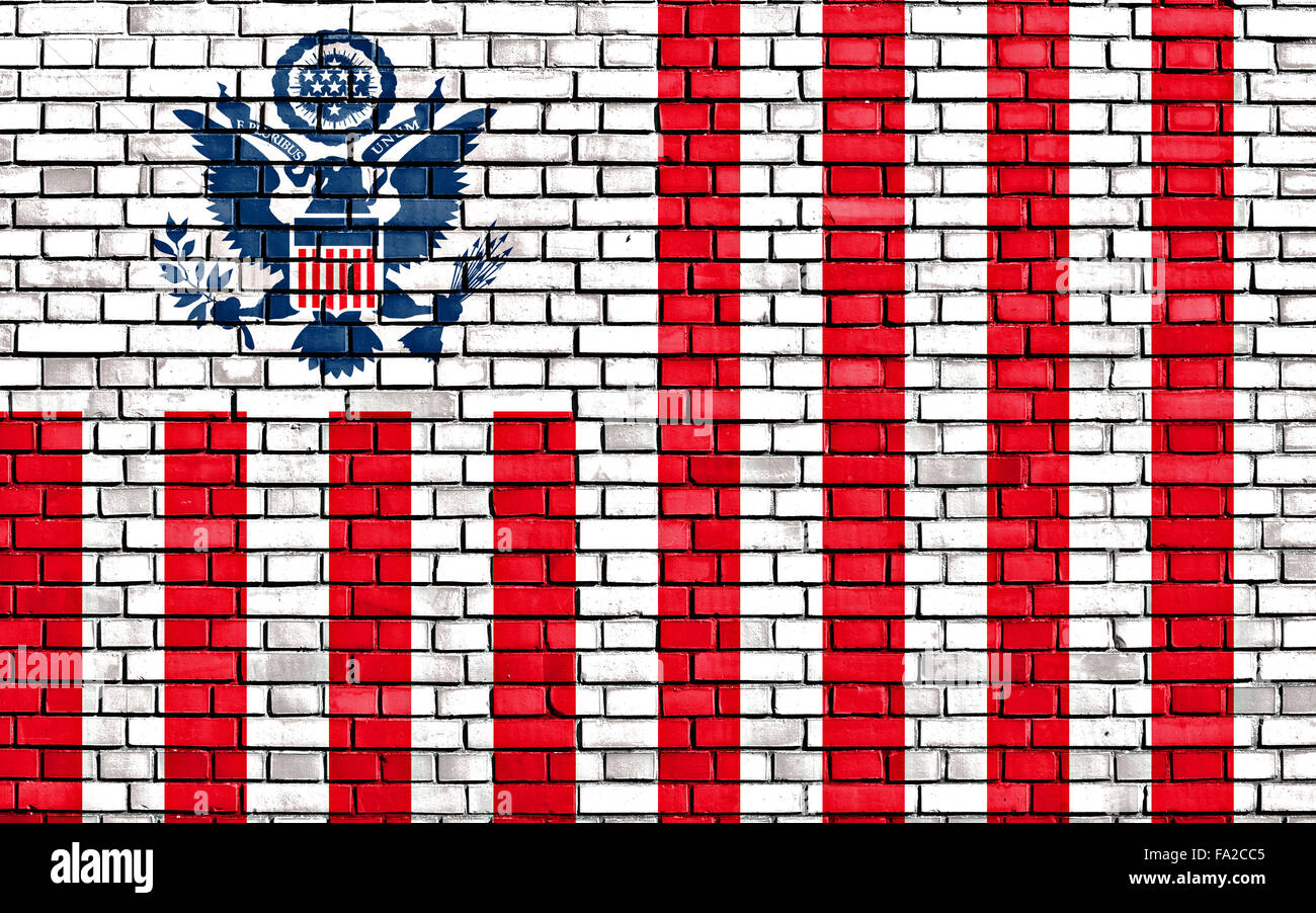 flag of United States Customs Service painted on brick wall Stock Photo