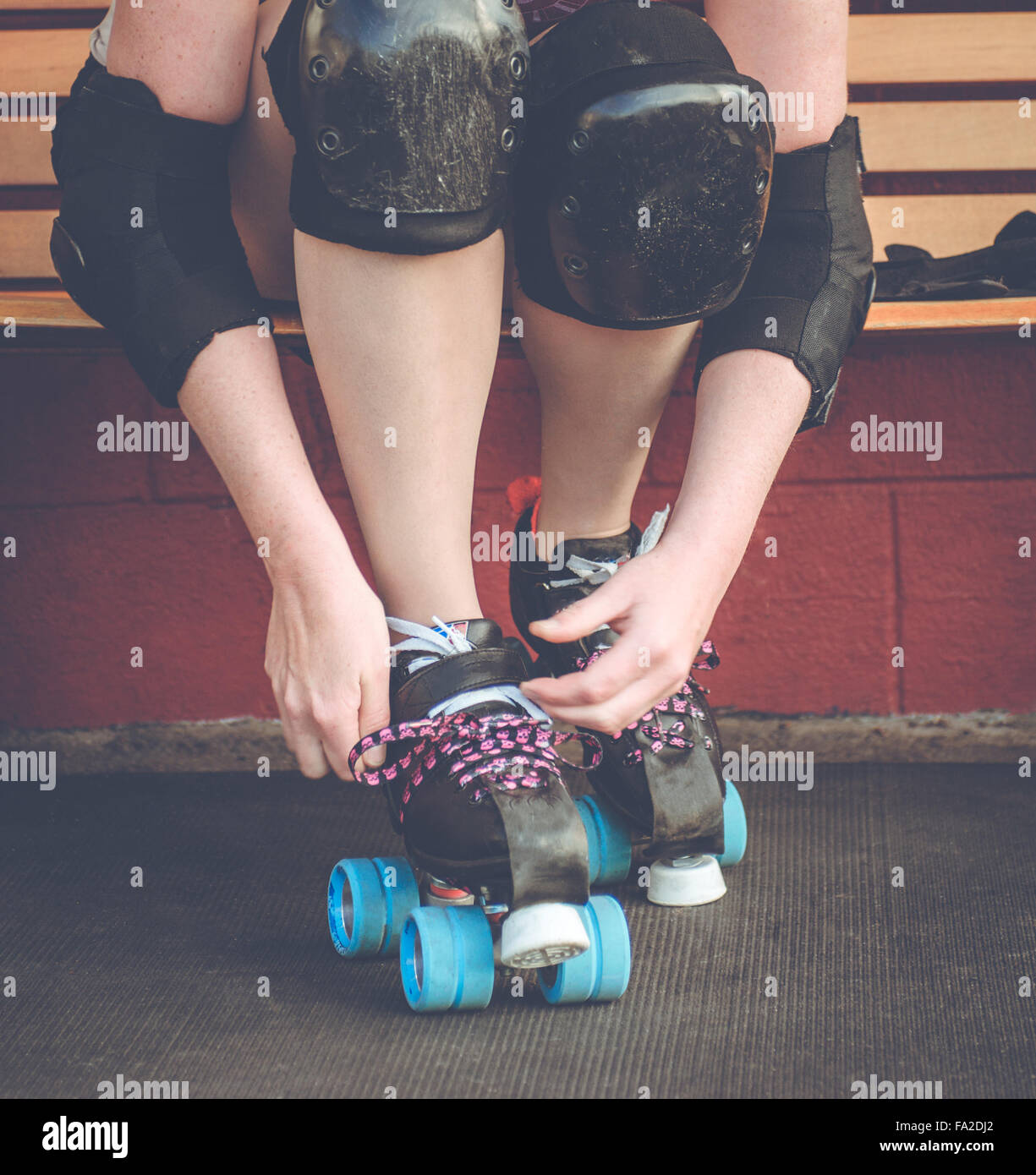Roller derby, roller skating woman outside of roller rink with roller