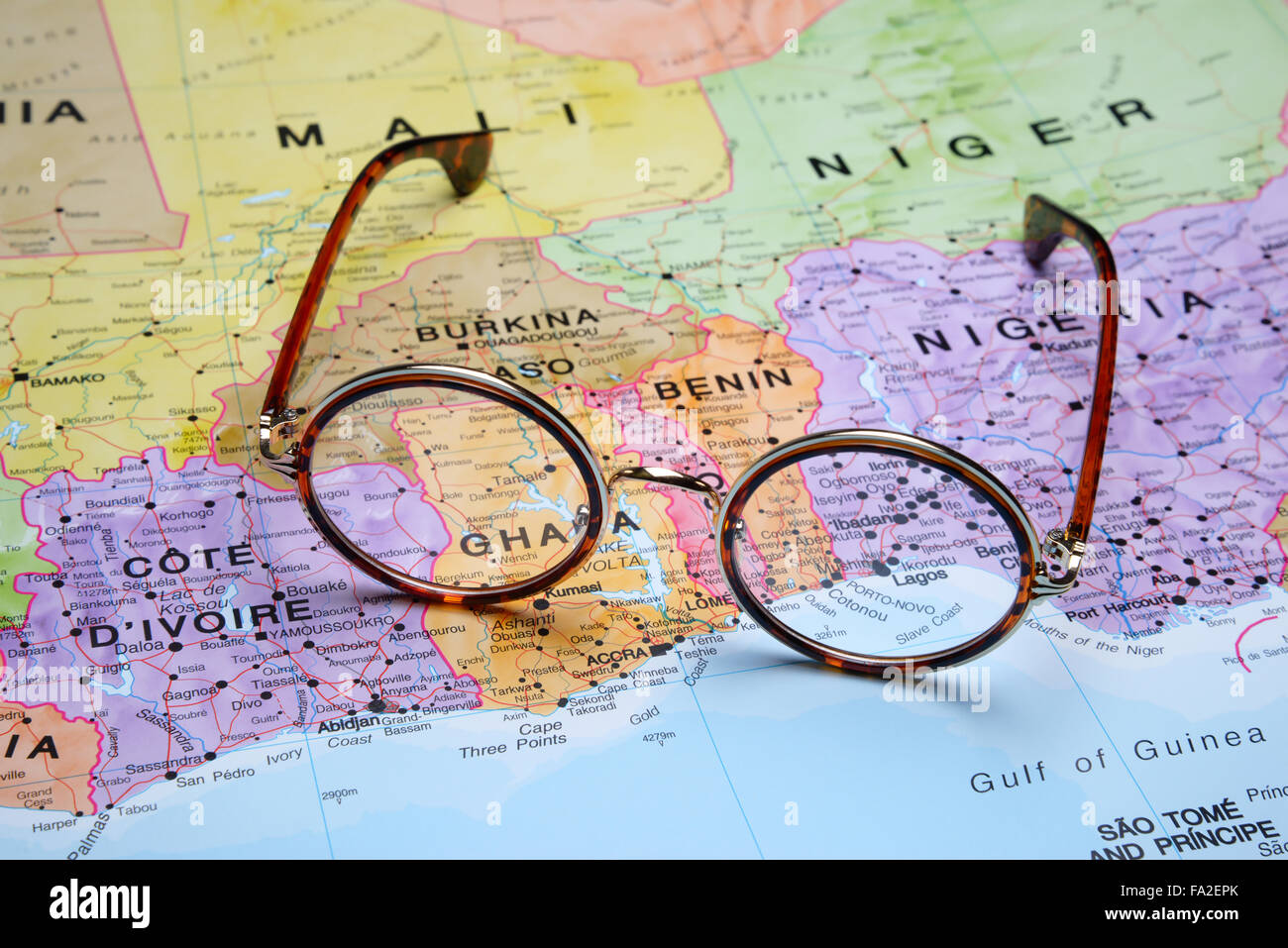 Glasses on a map - Porto Novo Stock Photo