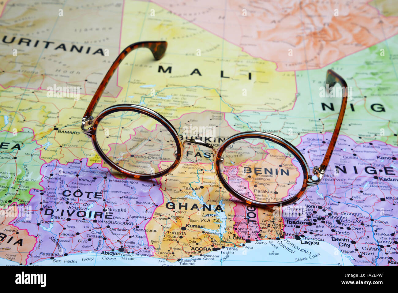 Glasses on a map - Benin Stock Photo