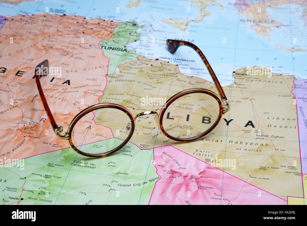 Glasses on a map - Libya Stock Photo