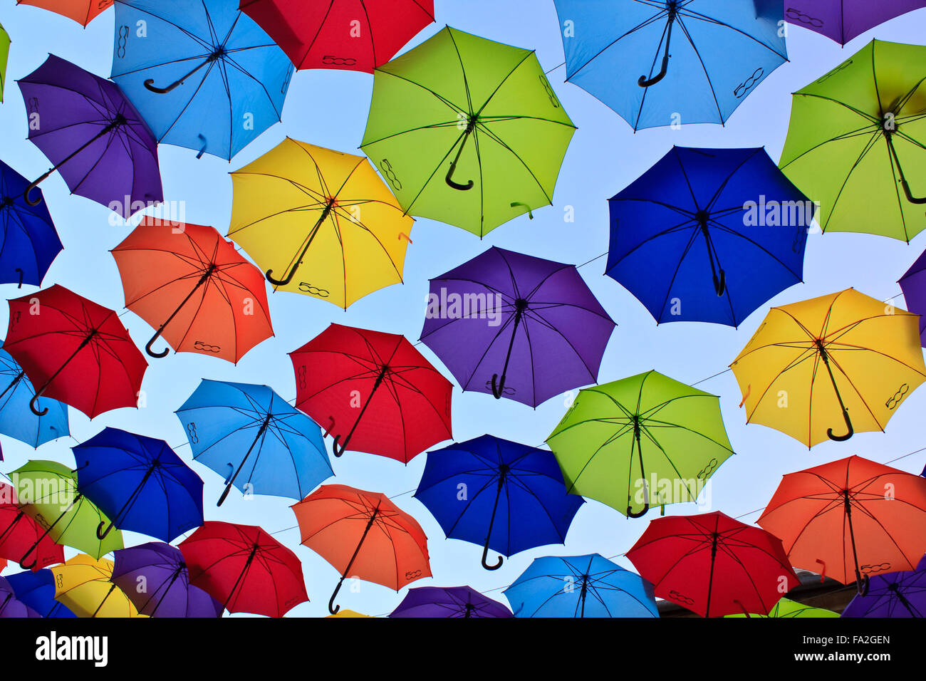 Colorful umbrellas in the sky Stock Photo