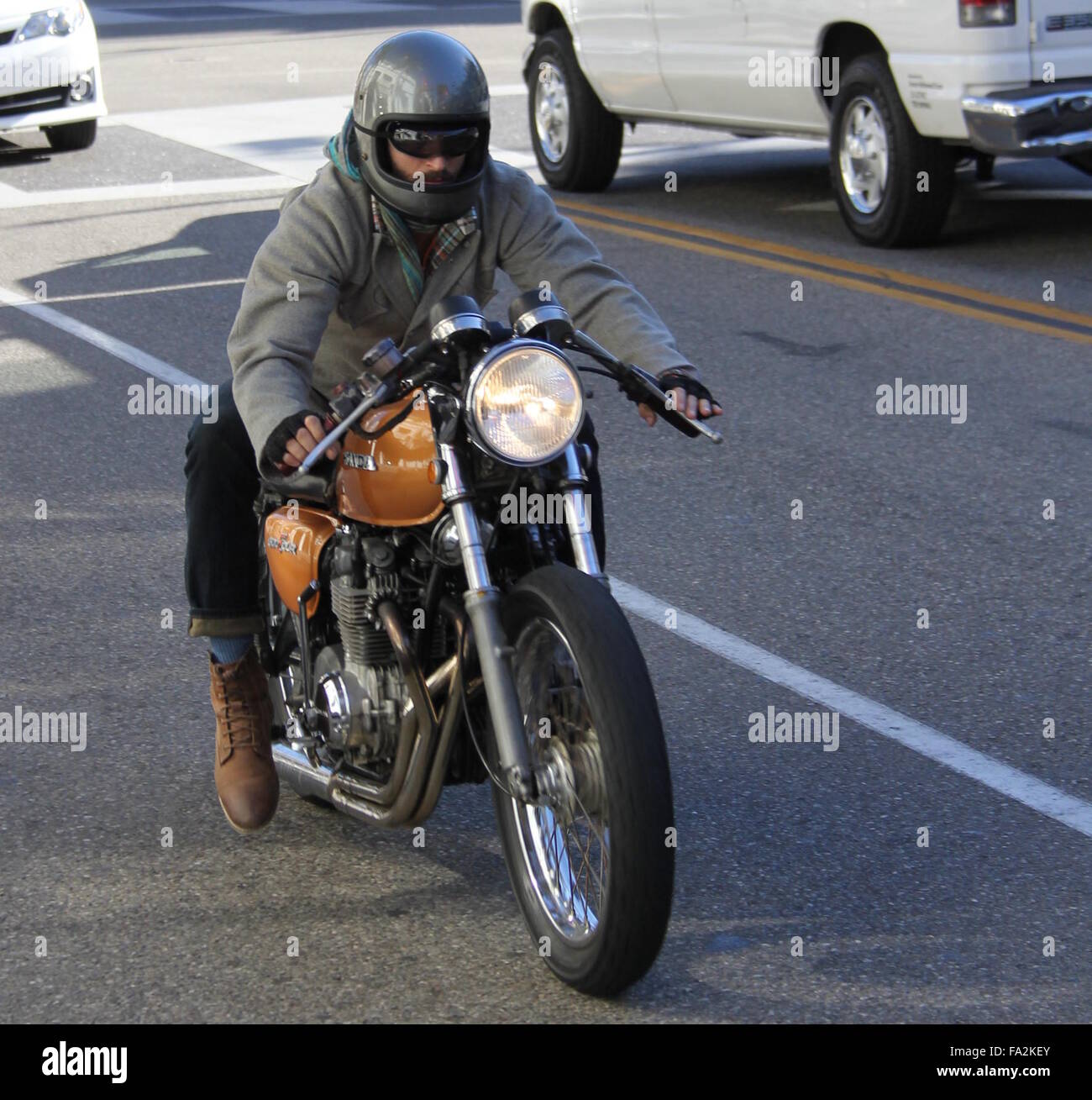 Keanu Reeves riding his motorbike with a silk scarf flying in the wind  Featuring: Keanu Reeves Where: Los Angeles, California, United States When:  19 Nov 2015 Stock Photo - Alamy