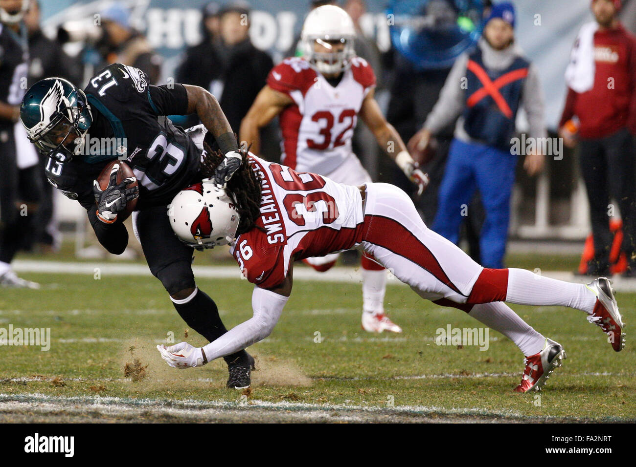 Philadelphia, Pennsylvania, USA. 20th Dec, 2015. Philadelphia Eagles wide receiver Josh Huff (13) in action against Arizona Cardinals defensive back D.J. Swearinger (36) during the NFL game between the Arizona Cardinals and the Philadelphia Eagles at Lincoln Financial Field in Philadelphia, Pennsylvania. The Arizona Cardinals won 40-17. The Arizona Cardinals clinch the NFC West Division. Christopher Szagola/CSM/Alamy Live News Stock Photo