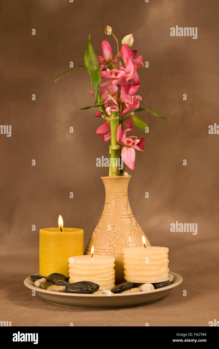 Three Candles With Bamboo Stock Photo