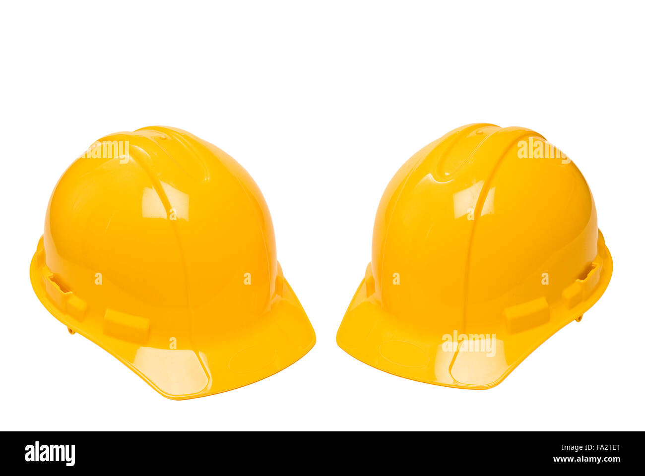 Two Yellow Hard Hats Isolated on White Stock Photo Alamy