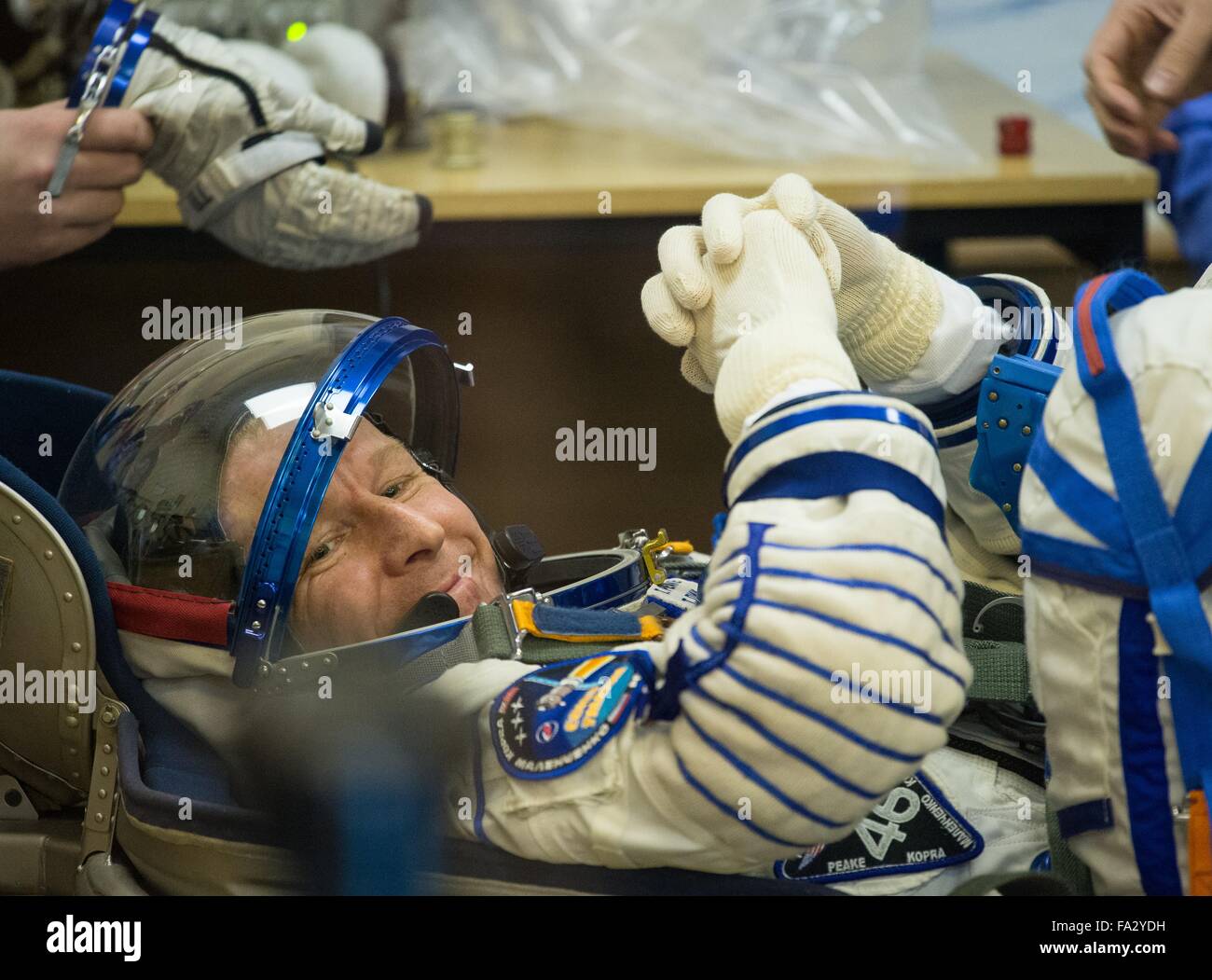 International Space Station Expedition 46 crew member British astronaut Tim Peake has his Sokol space suits adjusted in Building 254 before launch onboard the Soyuz TMA-19M spacecraft December 15, 2015 in Baikonur, Kazakhstan. Stock Photo