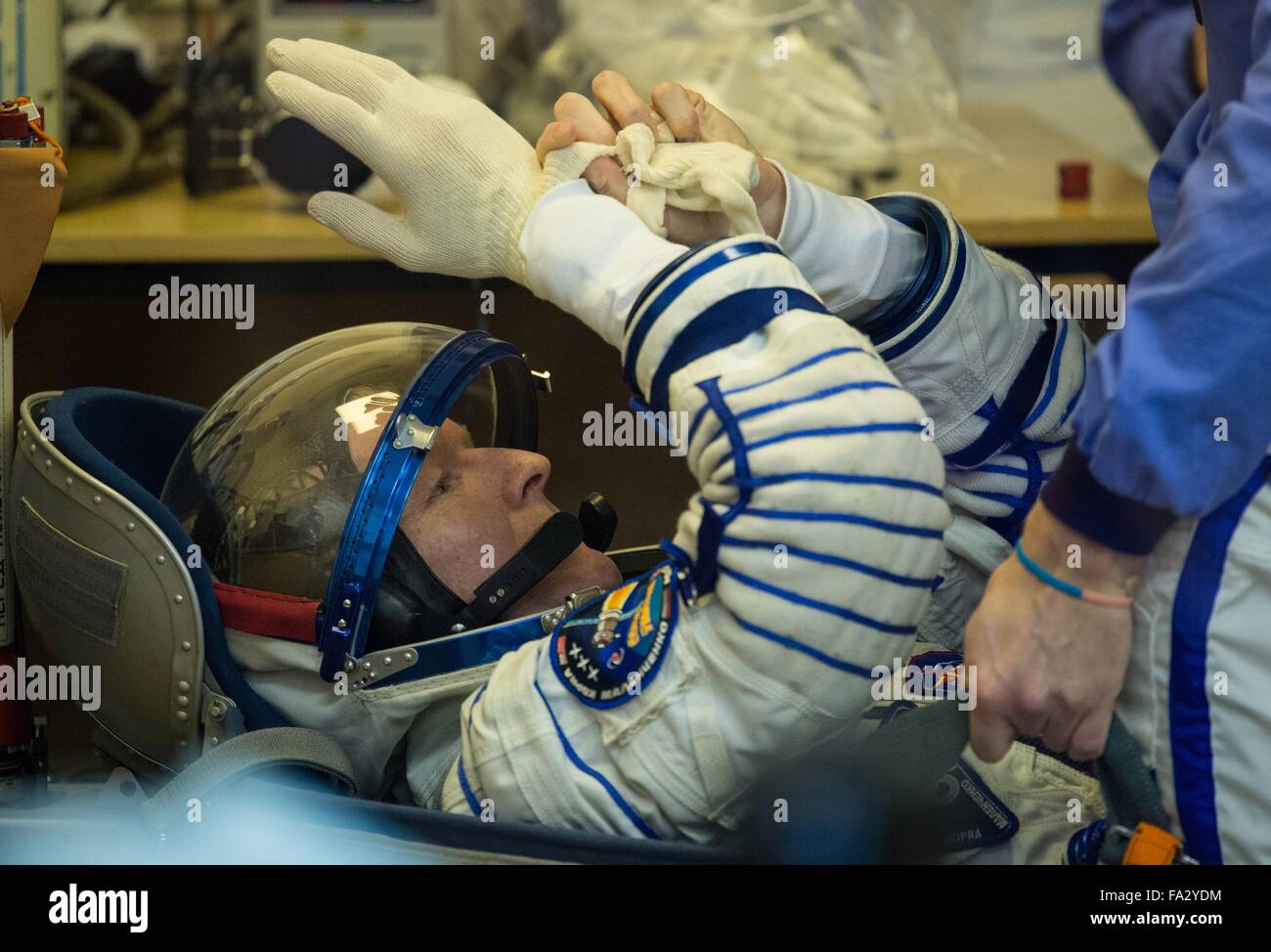 International Space Station Expedition 46 crew member British astronaut Tim Peake has his Sokol space suits adjusted in Building 254 before launch onboard the Soyuz TMA-19M spacecraft December 15, 2015 in Baikonur, Kazakhstan. Stock Photo
