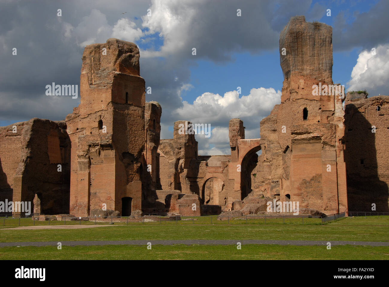 Ruins of the ancient roman Baths of Caracalla complex with beautiful sky Stock Photo