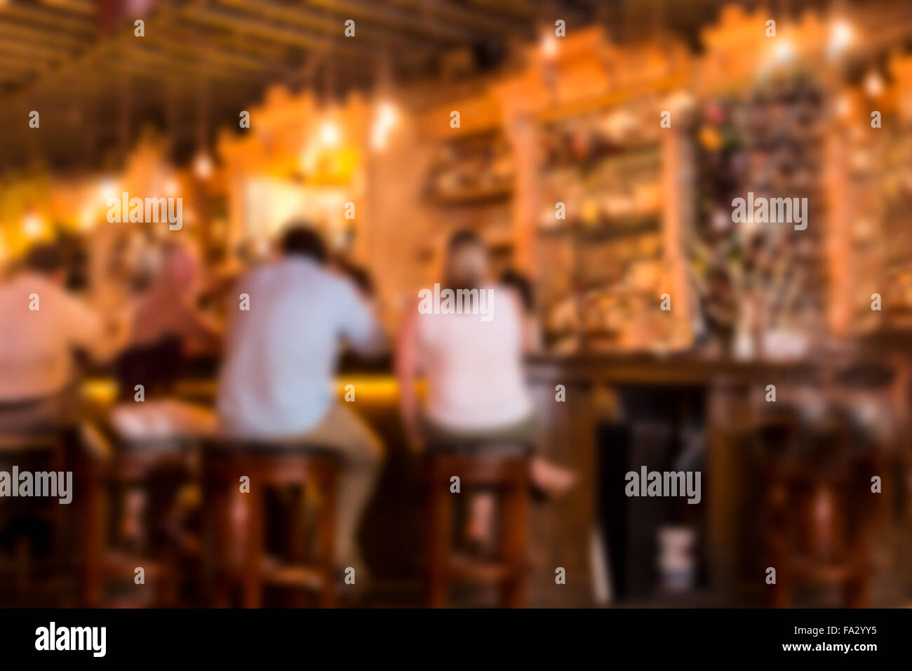 Defocused blur of typical bar with blurred people Stock Photo