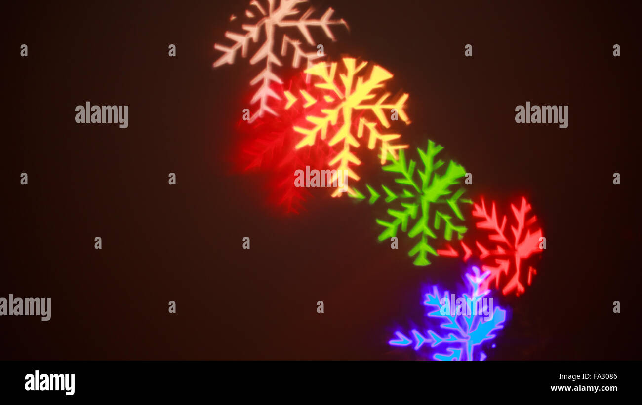 high quality snowflake light leak.. on dark background Stock Photo - Alamy