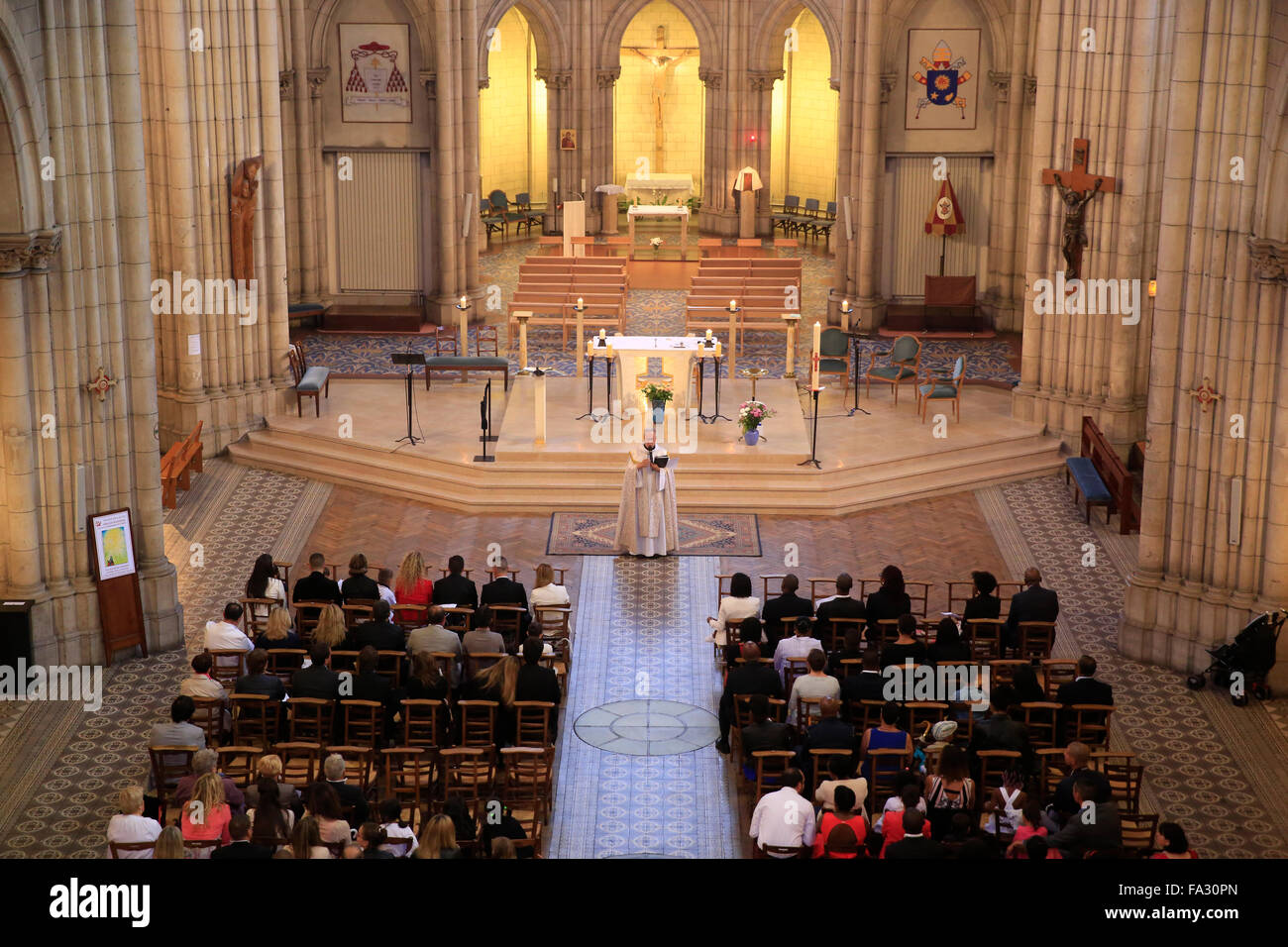 Mass in NotreDame du Perpetuel Secours basilica Stock Photo Alamy