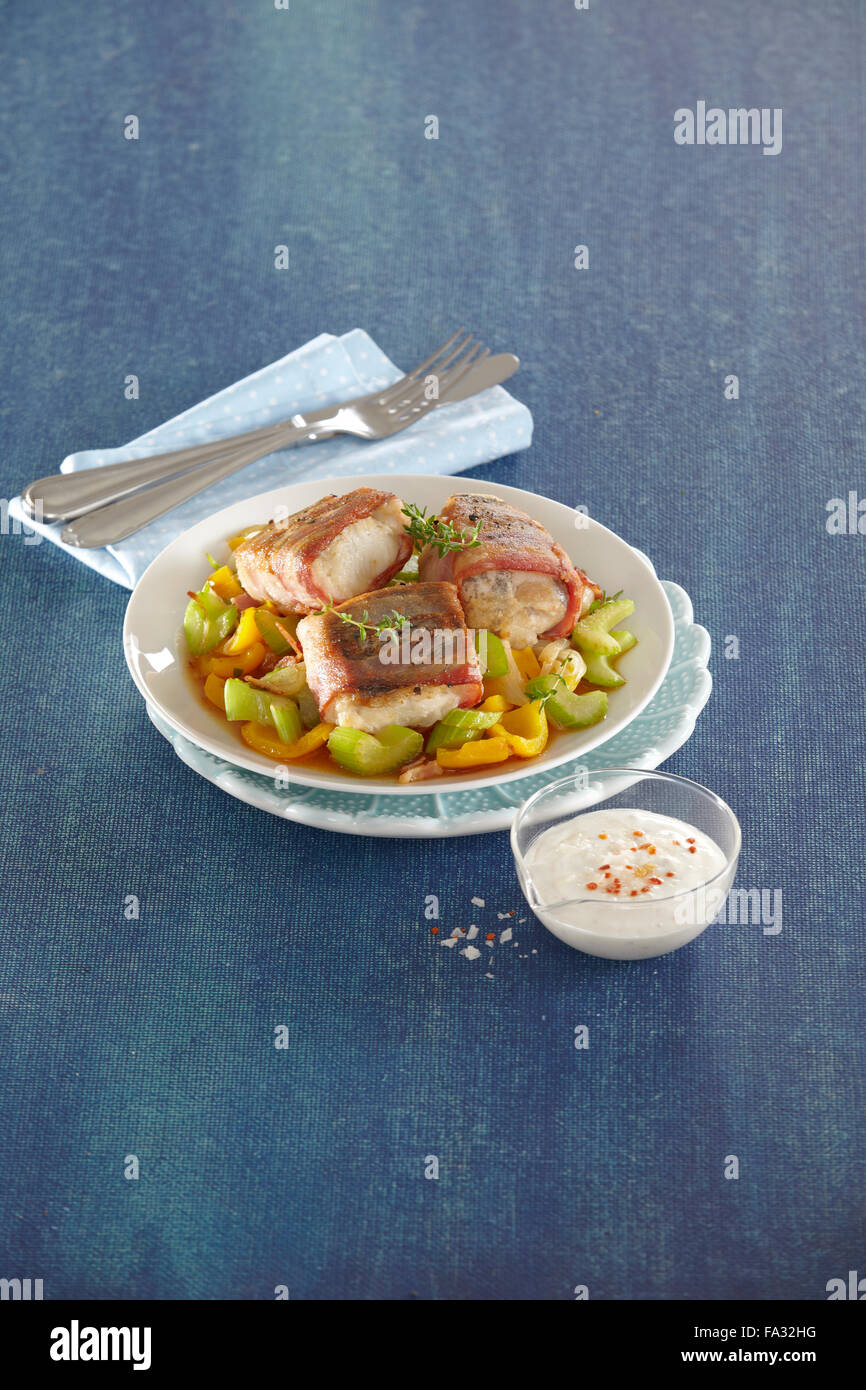 Catfish in bacon Stock Photo Alamy
